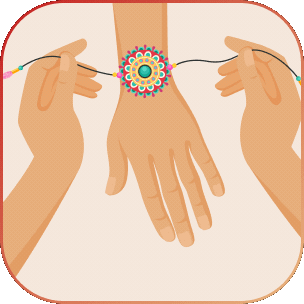 Hands tying a Rakhi