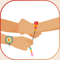 Hands exchanging Rakhis